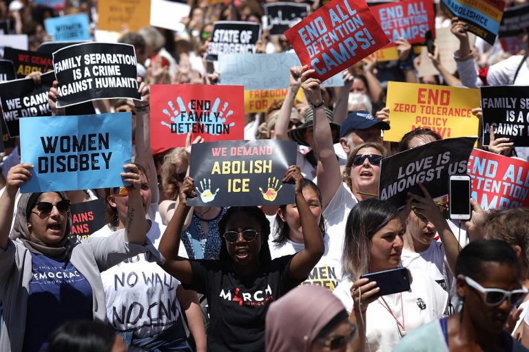 Anti-ICE demonstrators and counter-protesters face off in Aurora, Colorado